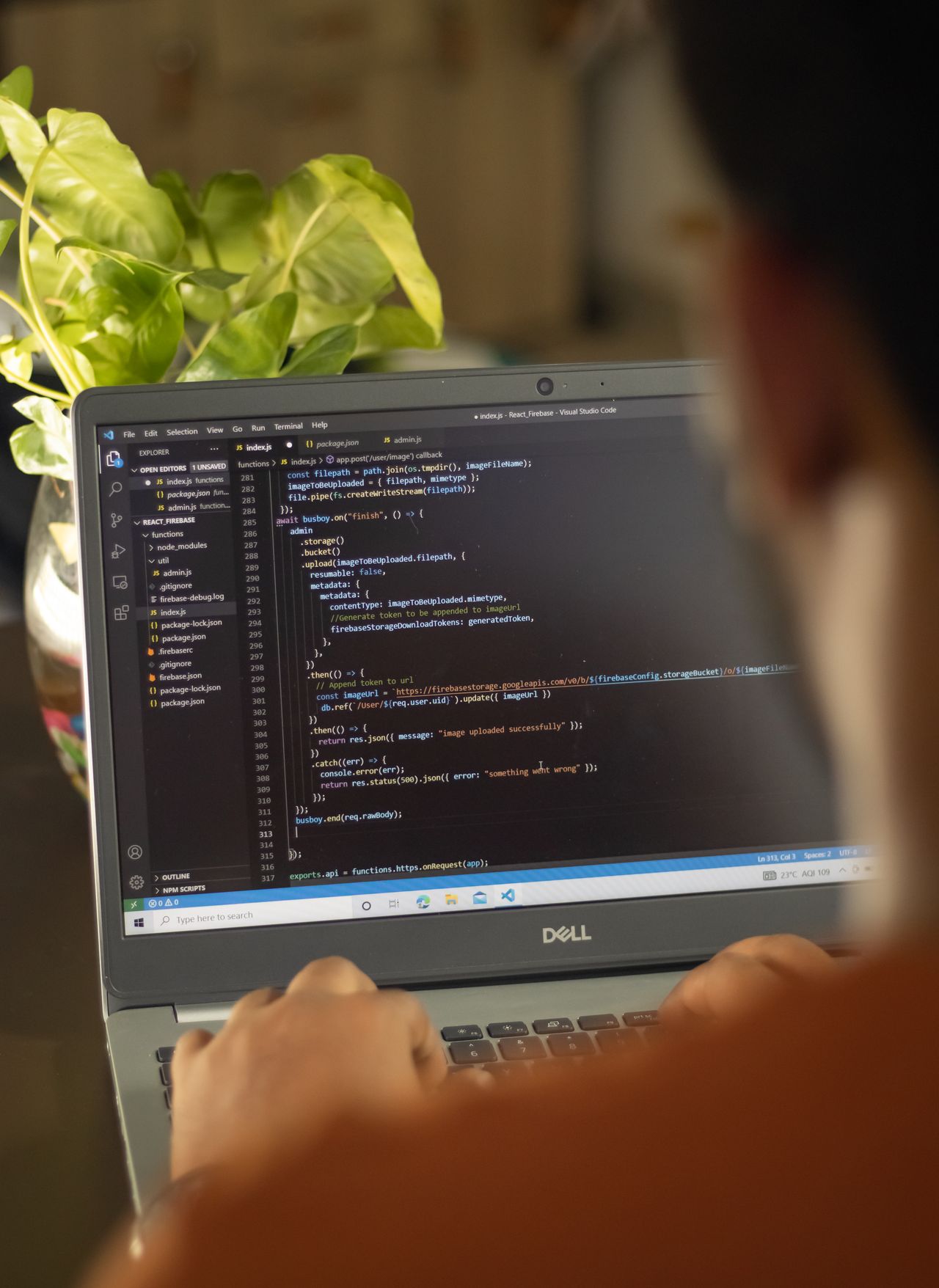 A developer building a website in code